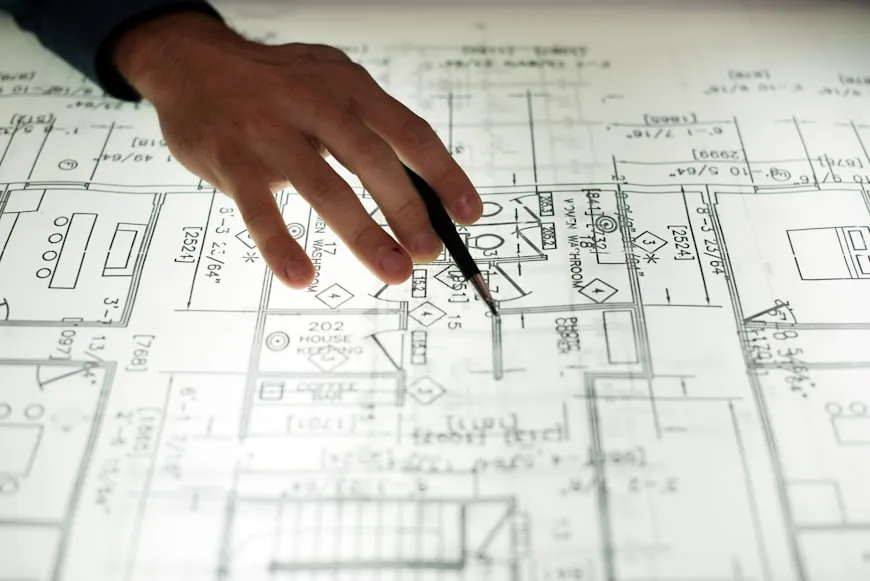 Close up of hands working on layout
